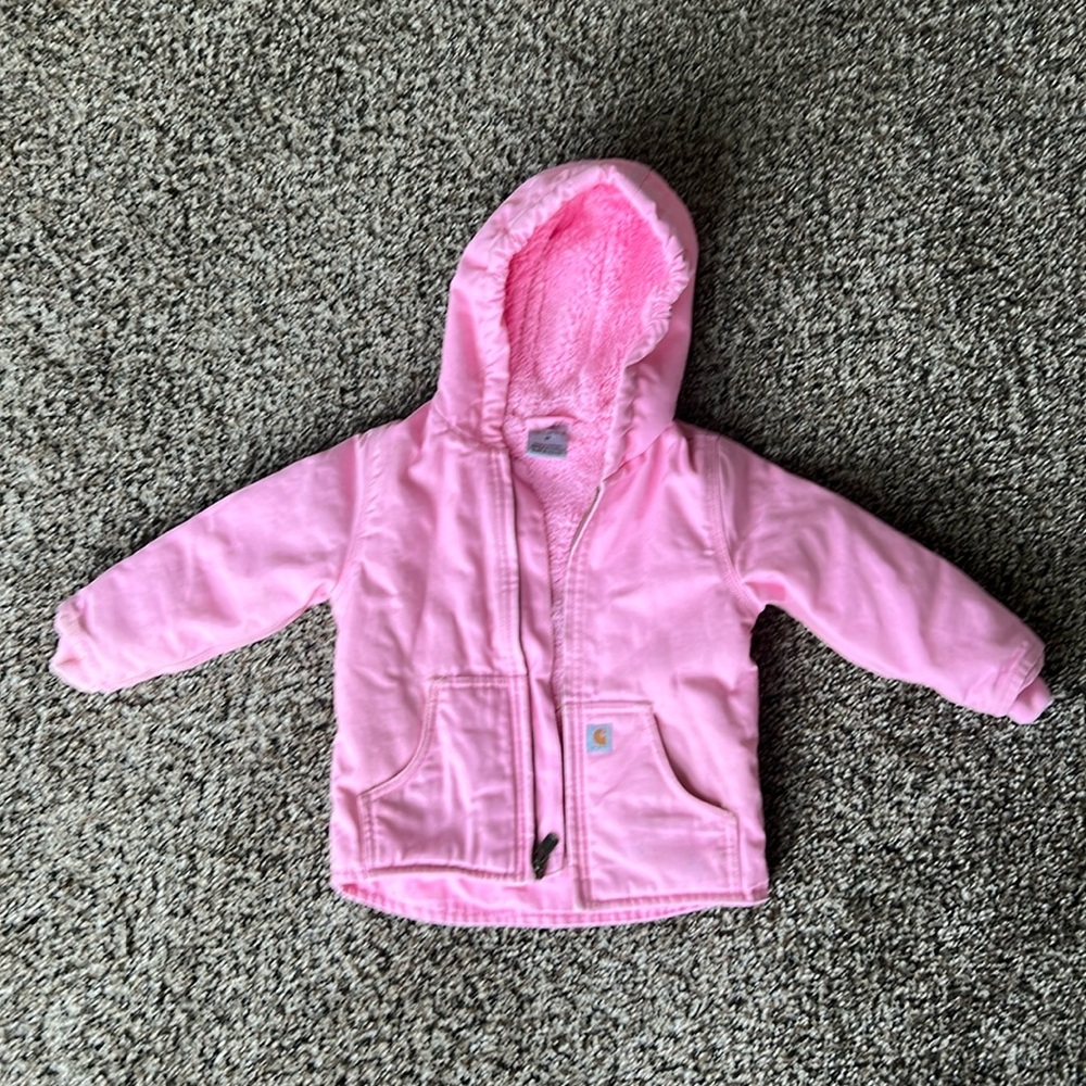 Pink Carhartt coat.